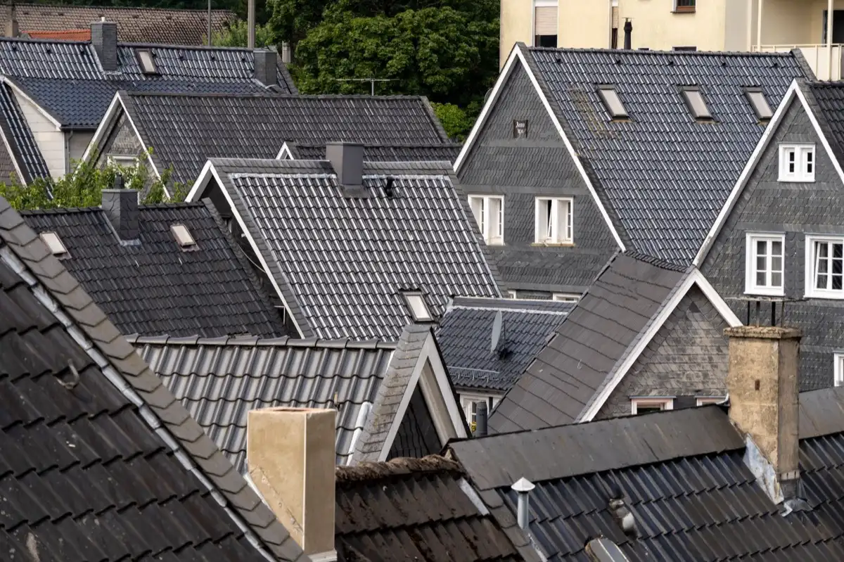 Steep roof eaves and gutter lines on houses in Utica, NY